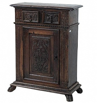 Walnut side table with carvings, early 19th century