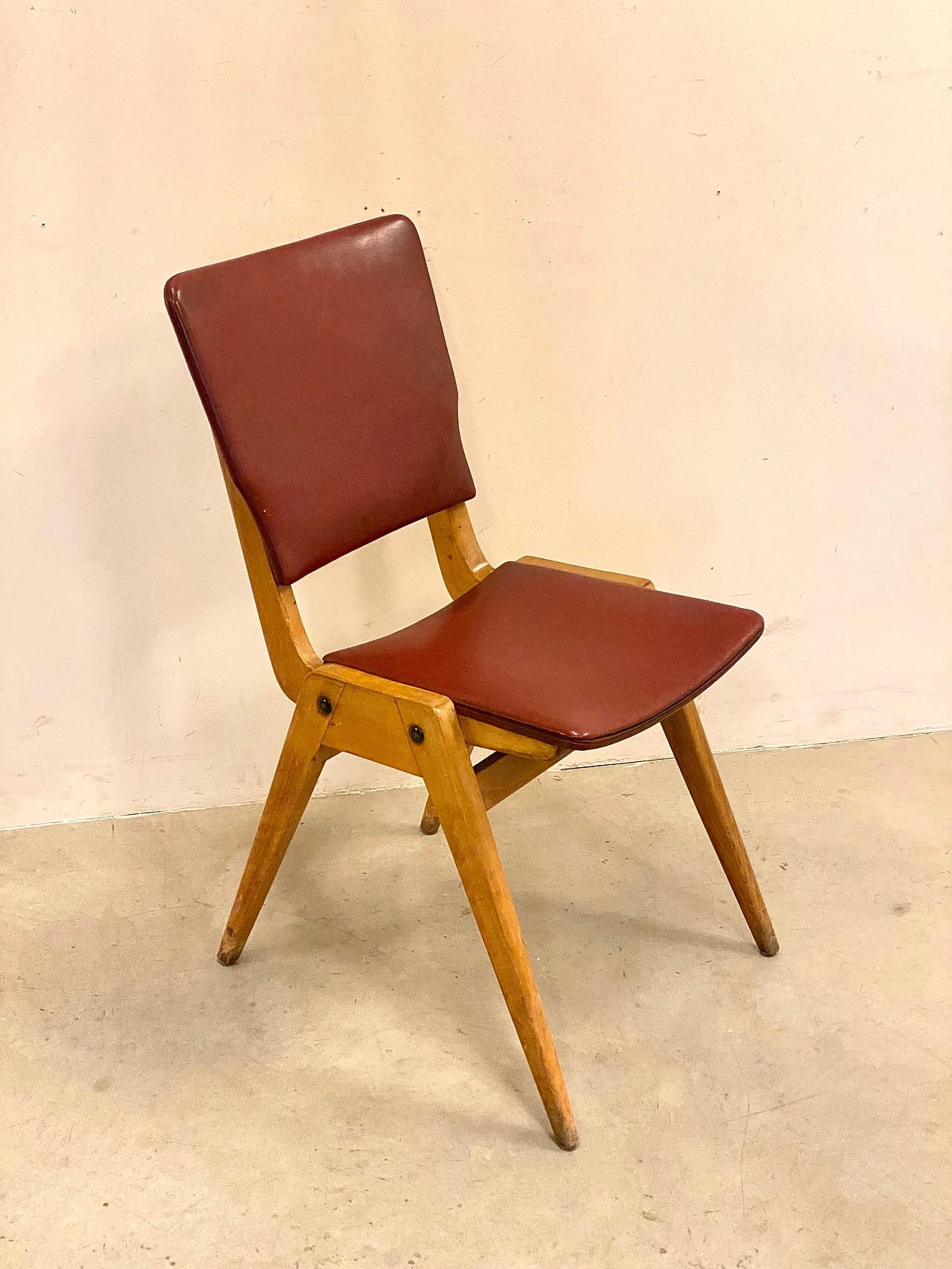 4 Beech and leatherette chairs, 1950s 5
