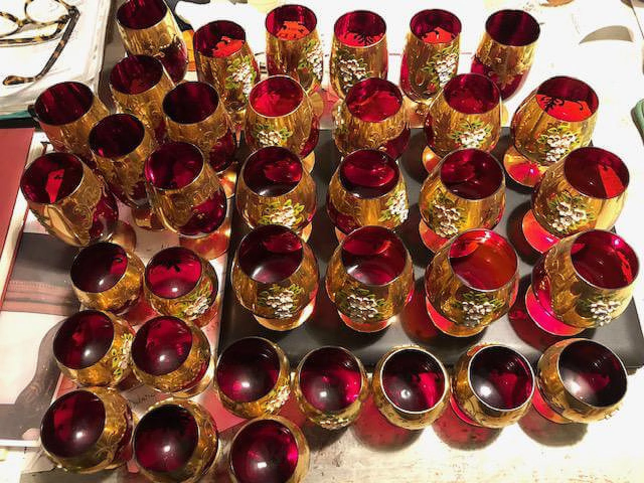 36 Glasses in three sizes decorated with relief flowers 1