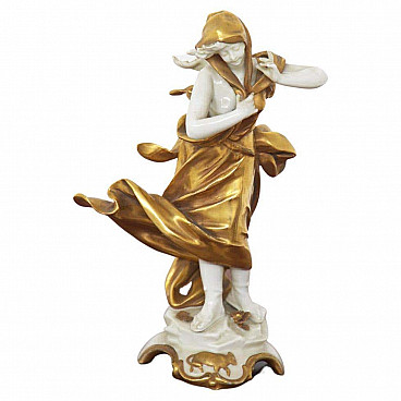 Taurus figurine in gilded Capodimonte ceramic, early 20th century