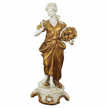 Libra statuette in gilded Capodimonte ceramic, early 20th century