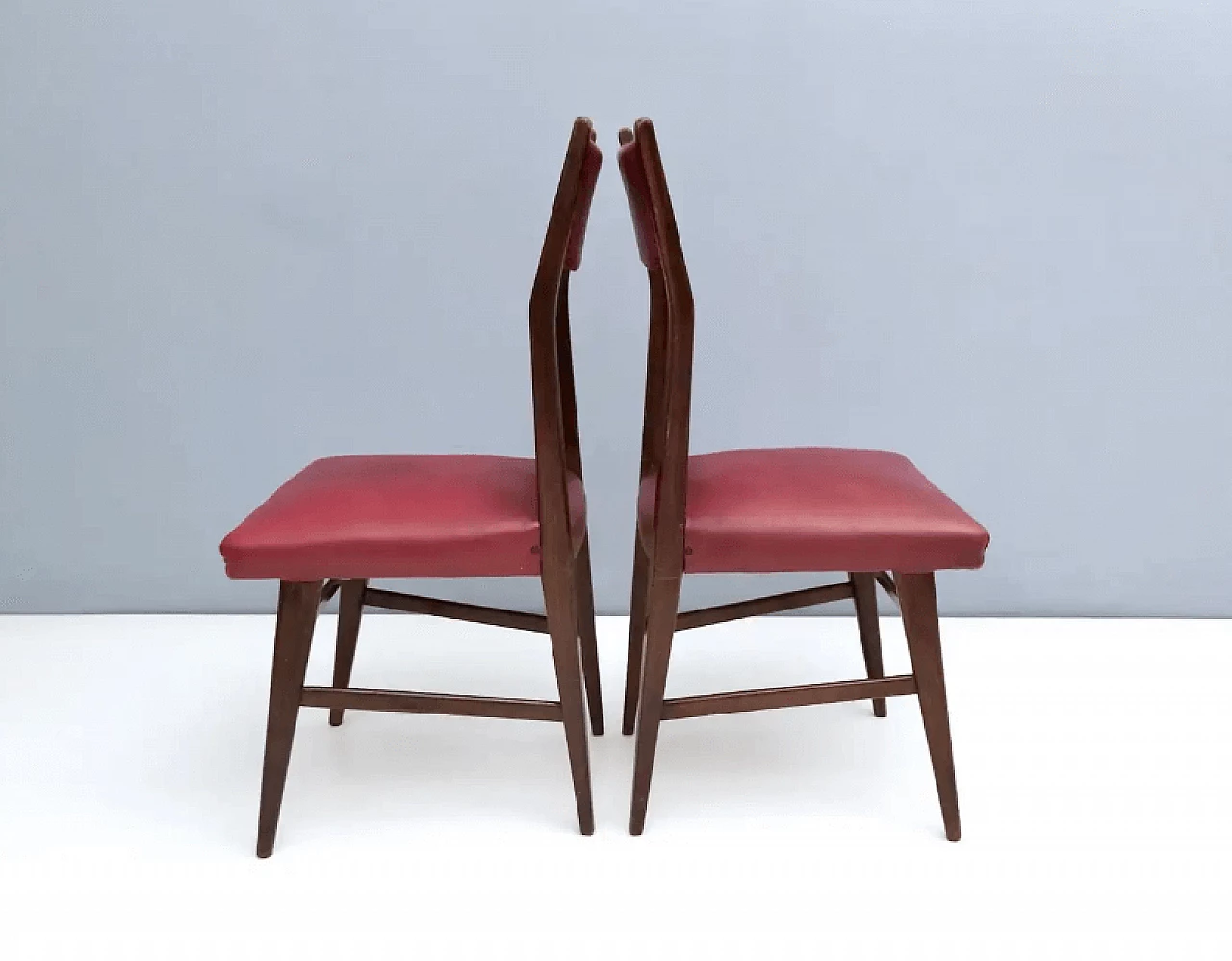4 Dining chairs in ebonised beech and crimson Skai, 1950s 5