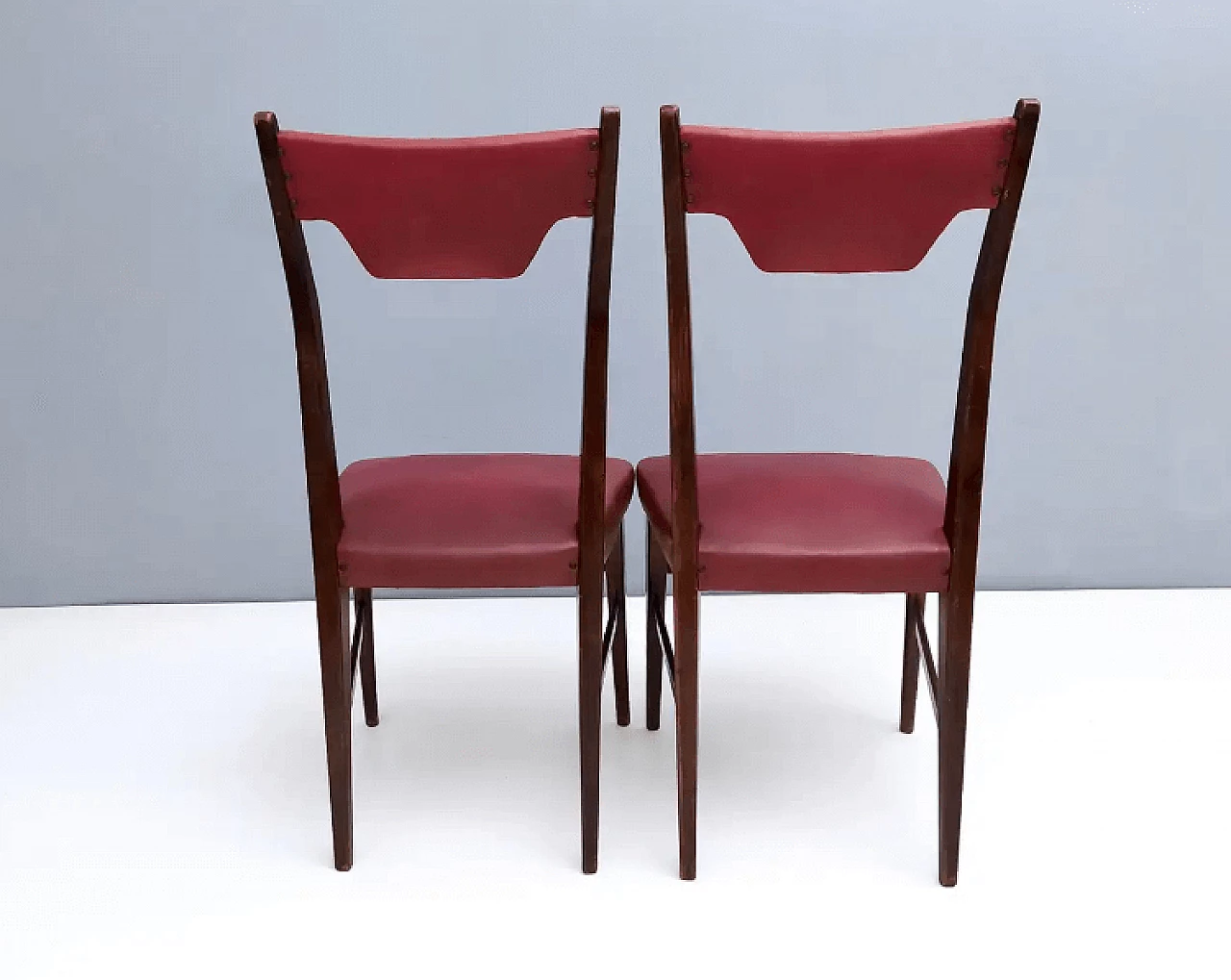 4 Dining chairs in ebonised beech and crimson Skai, 1950s 6