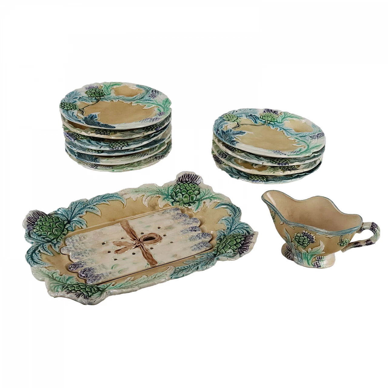 Servizio da tavola in ceramica Barbotine con decori policromi a rilievo 1