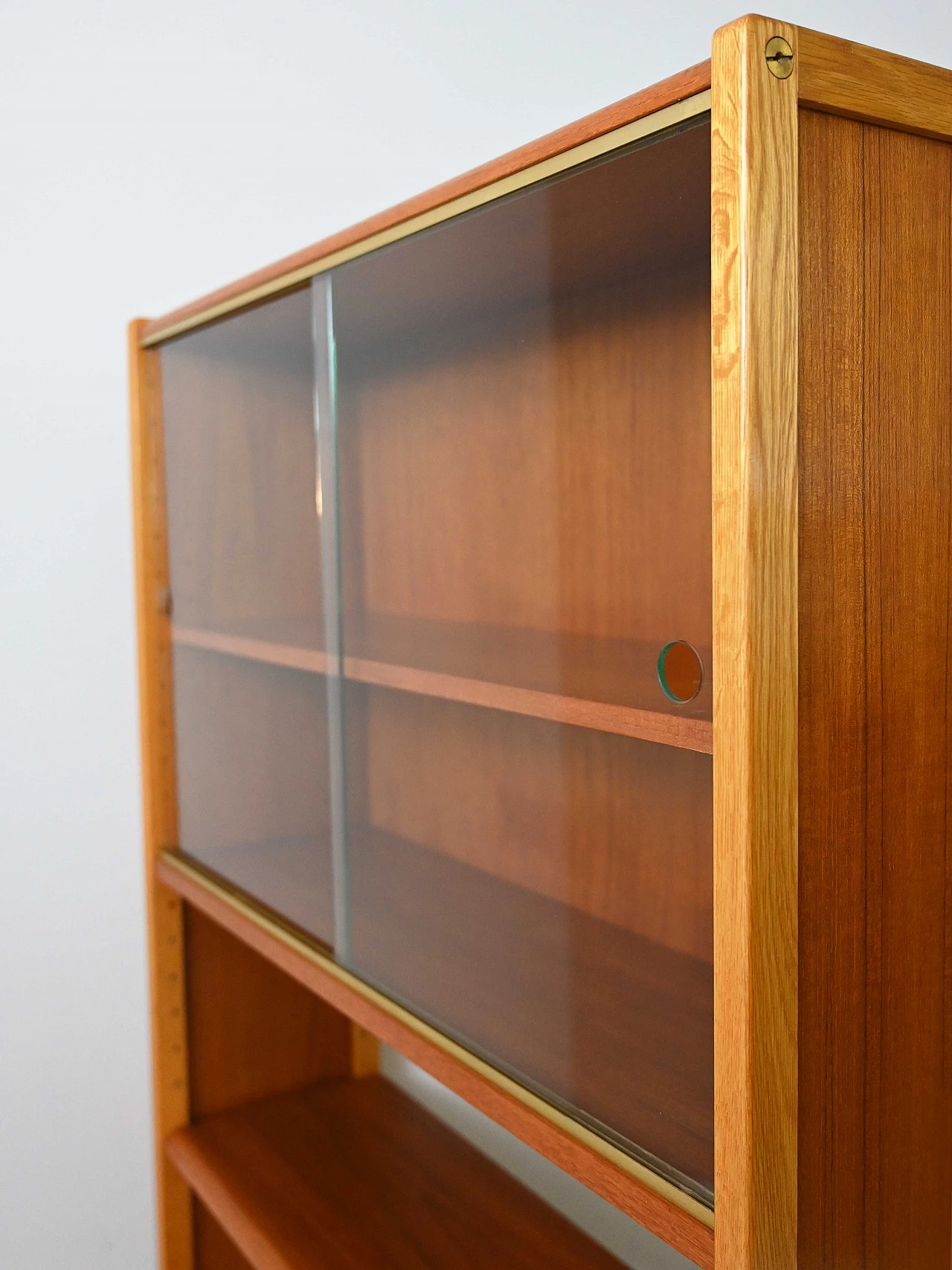 Scandinavian teak and oak bookcase with sliding doors, 1960s 11