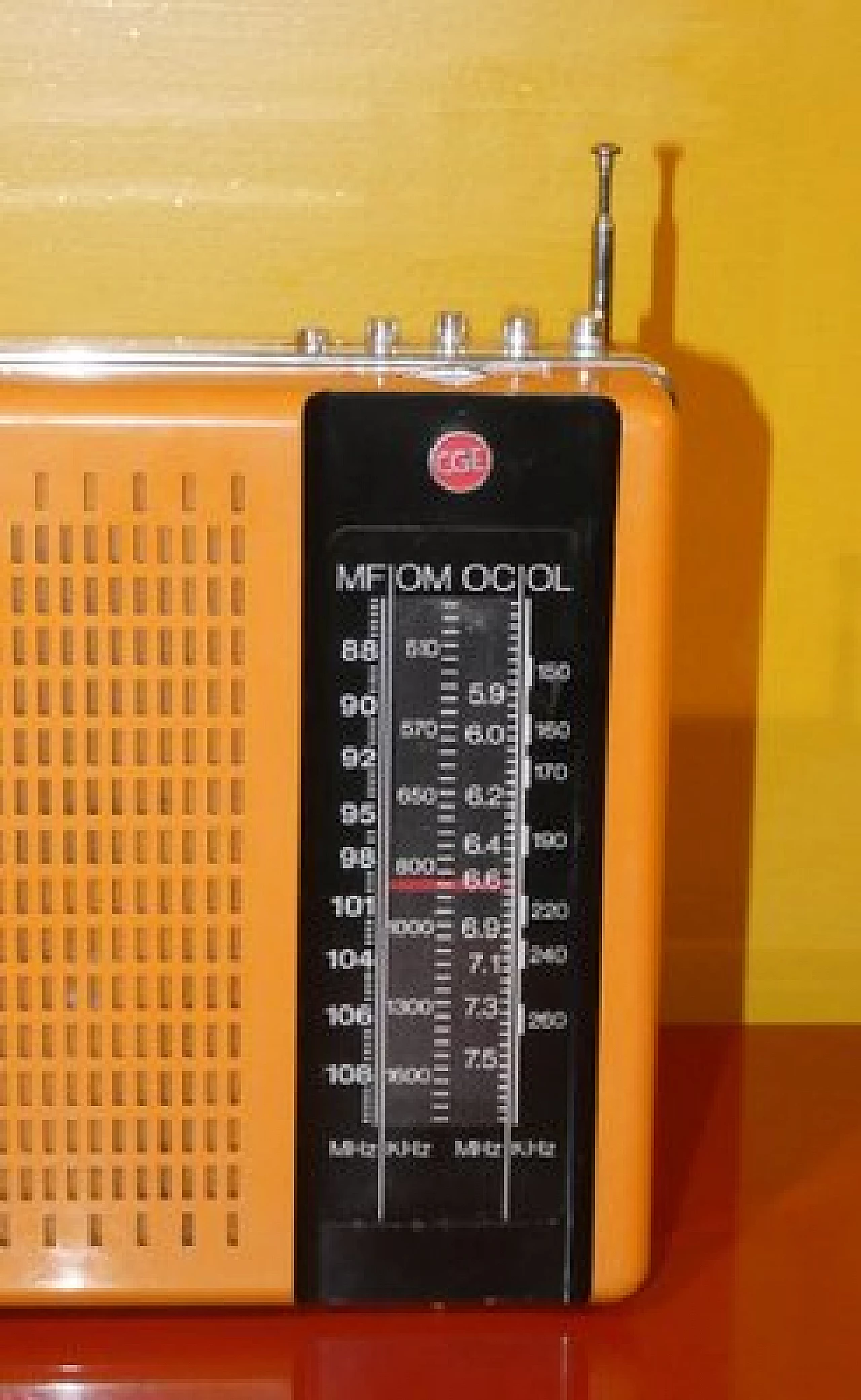 Orange and black plastic portable radio by CGE, 1970s 2