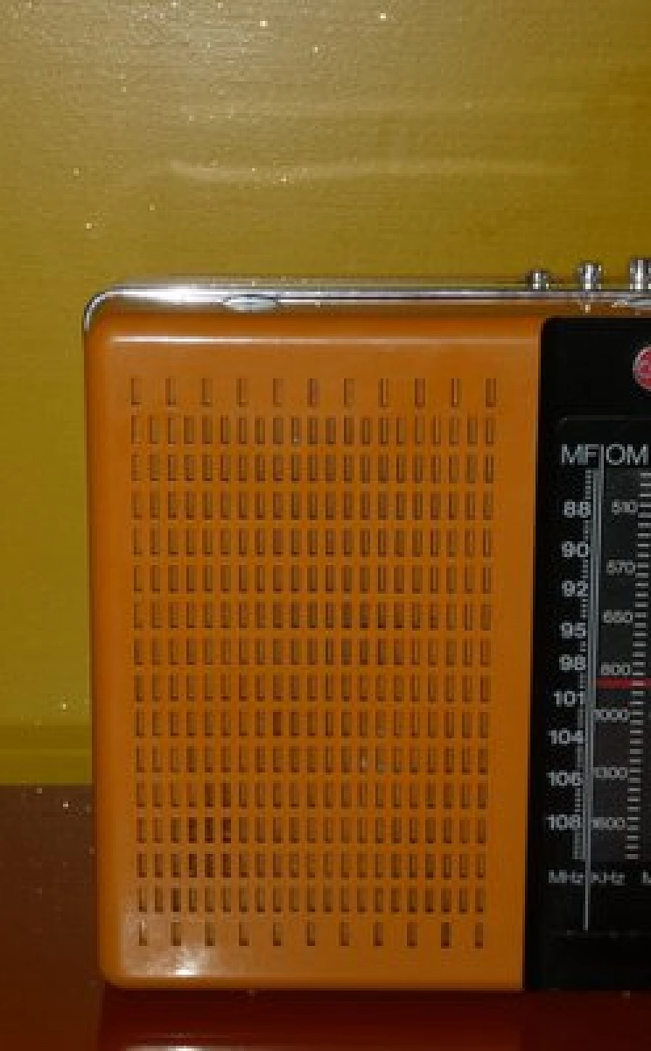 Orange and black plastic portable radio by CGE, 1970s 4