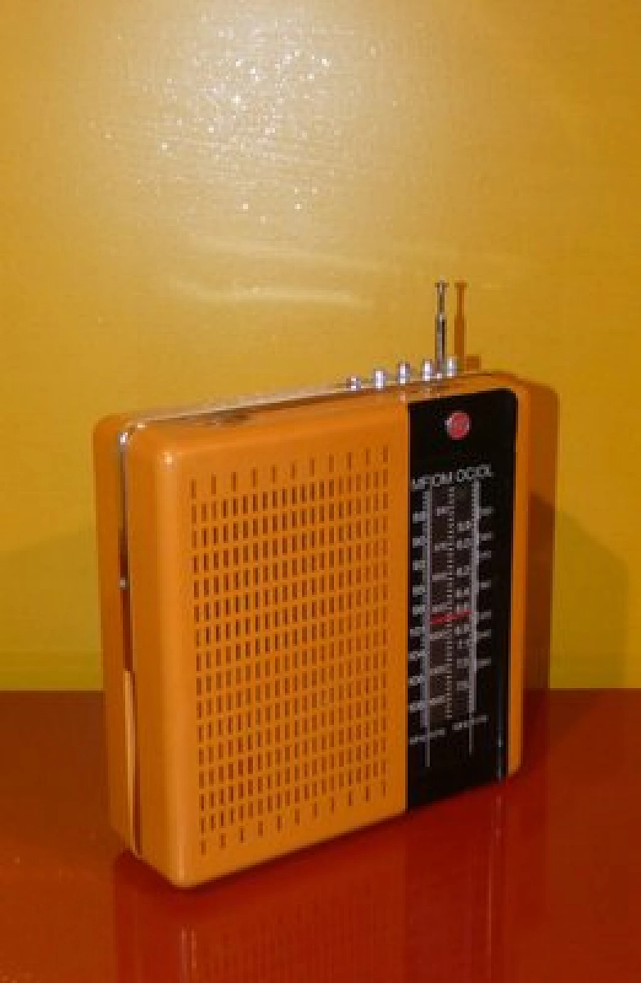 Orange and black plastic portable radio by CGE, 1970s 5