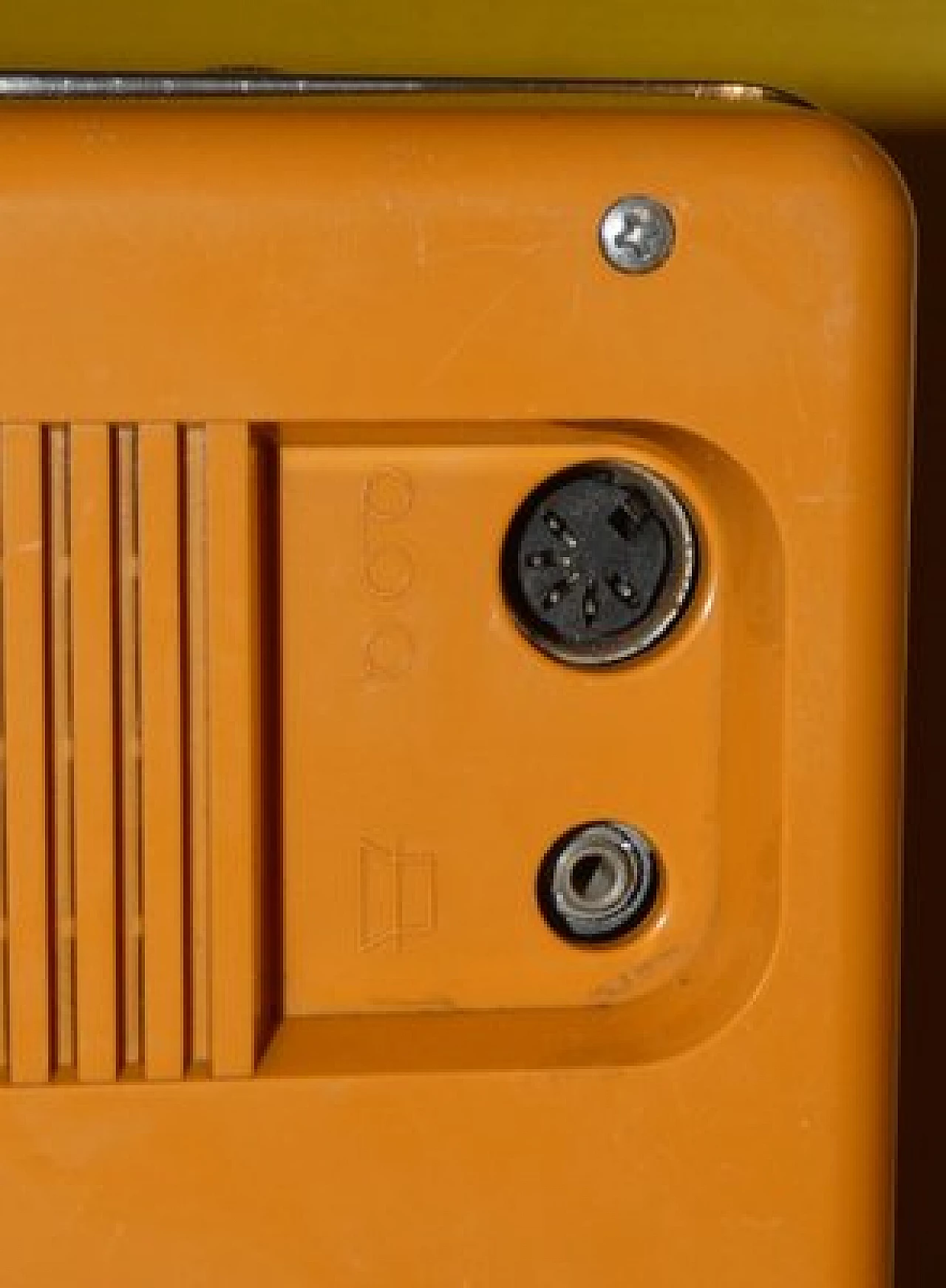 Orange and black plastic portable radio by CGE, 1970s 12