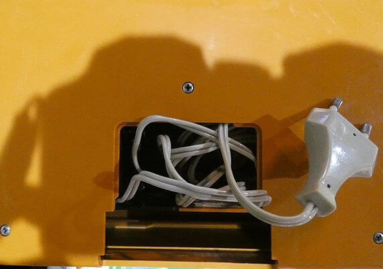 Orange and black plastic portable radio by CGE, 1970s 15