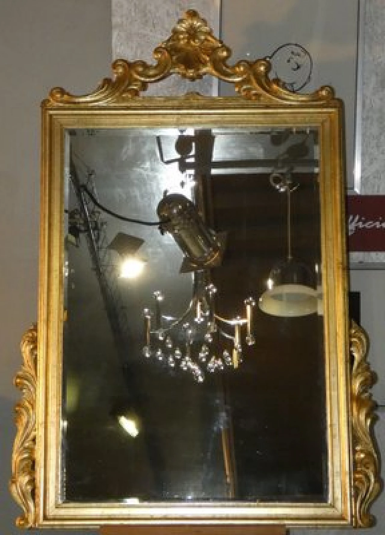Gilded wood mirror with curls and scrolls, early 20th century 1