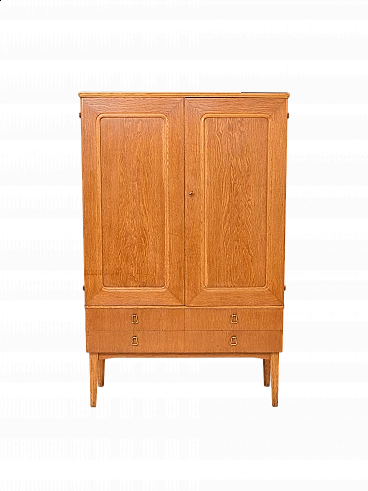 Wooden wardrobe with shaped doors and drawers, 1950s