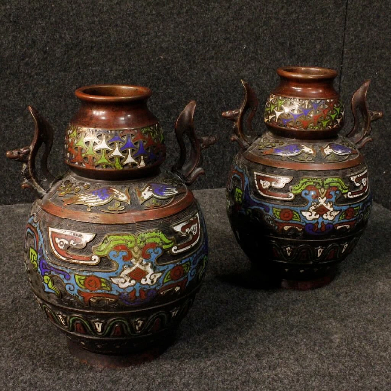 Pair of oriental chiseled metal vases with cloisonné enamels 1