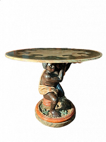 Lacquered wooden table supported by Venetian Moor, second half of the 19th century