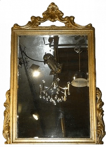 Specchio in legno dorato con riccioli e volute, inizio '900