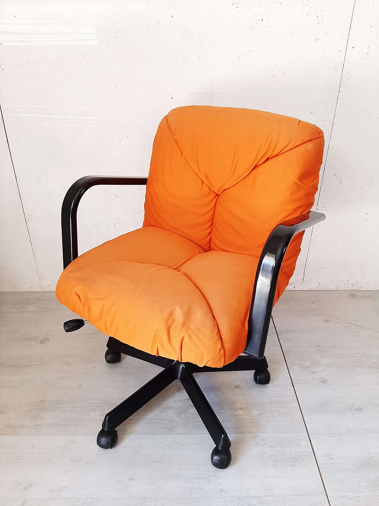 Upholstered swivel chair with wheels by De Padova, 1980s 1