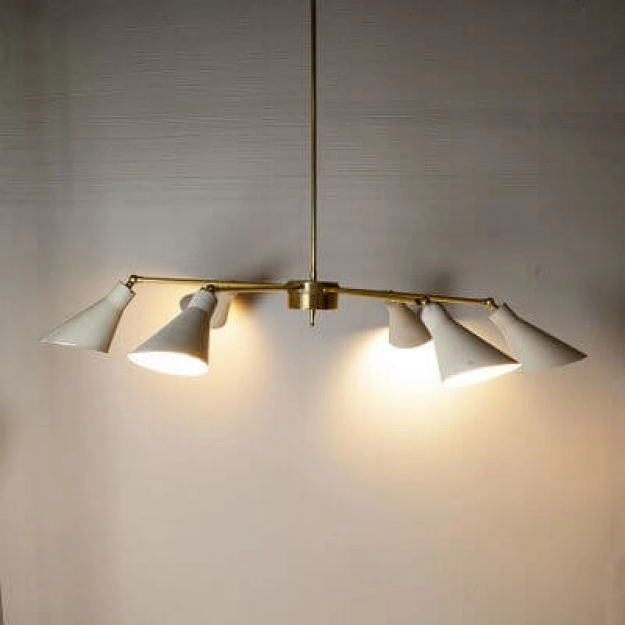 Light chandelier with aluminium shades and brass frame in the style of Stilnovo Models, 1950s 3