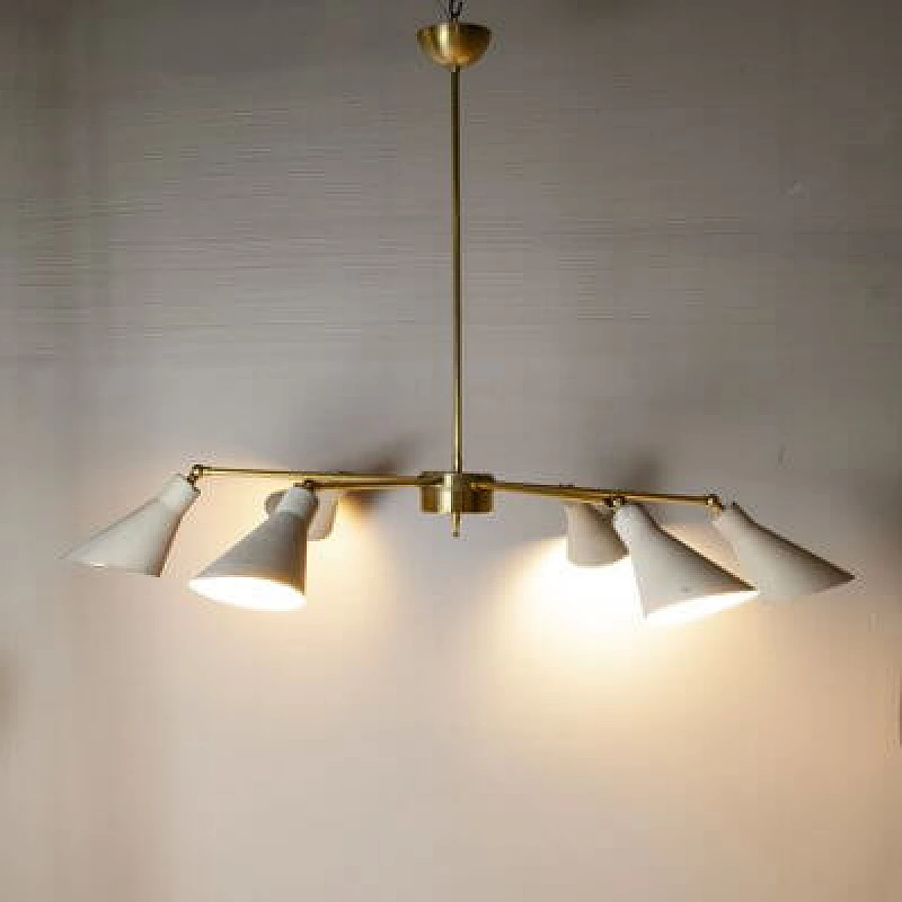 Light chandelier with aluminium shades and brass frame in the style of Stilnovo Models, 1950s 5