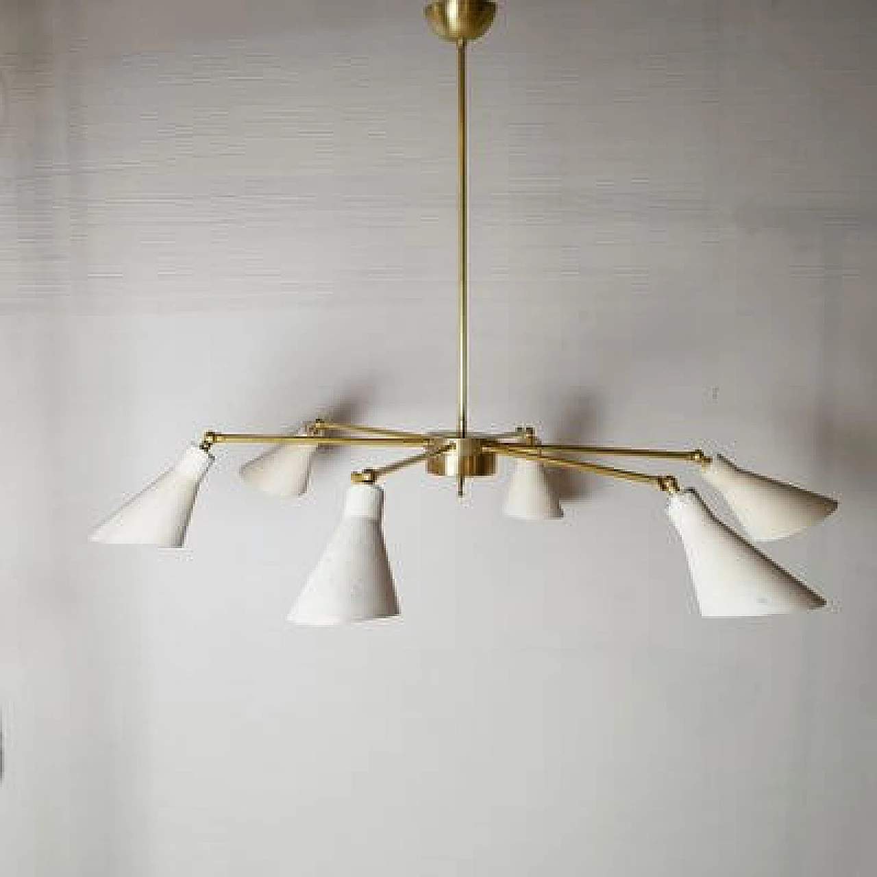 Light chandelier with aluminium shades and brass frame in the style of Stilnovo Models, 1950s 6