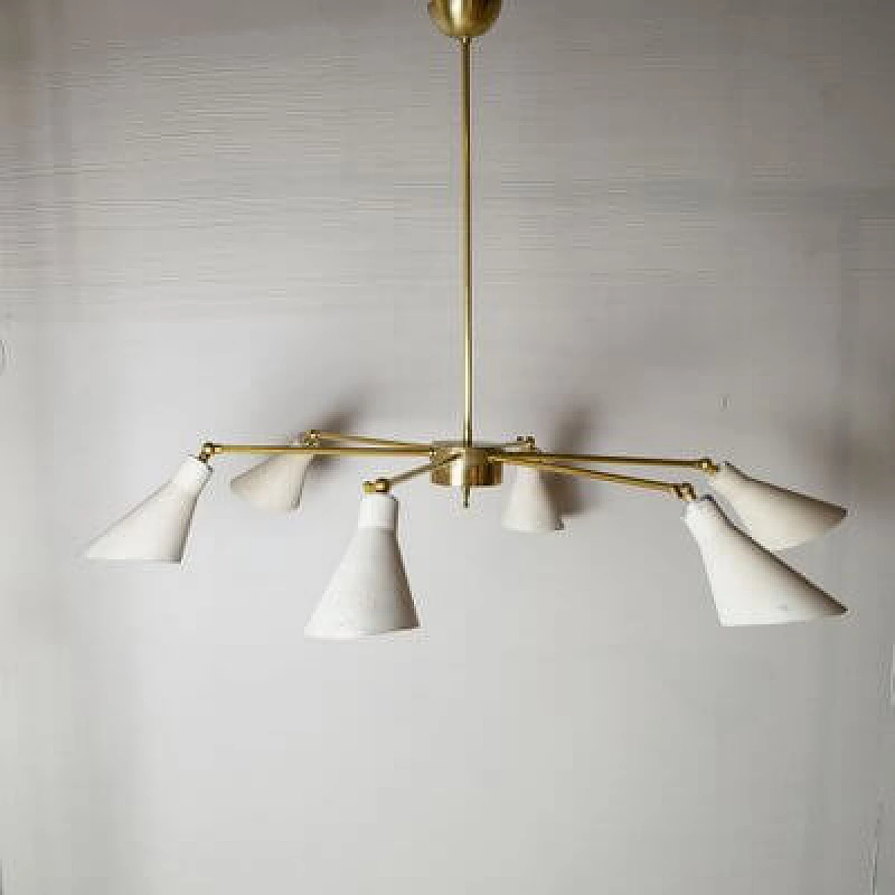 Light chandelier with aluminium shades and brass frame in the style of Stilnovo Models, 1950s 7
