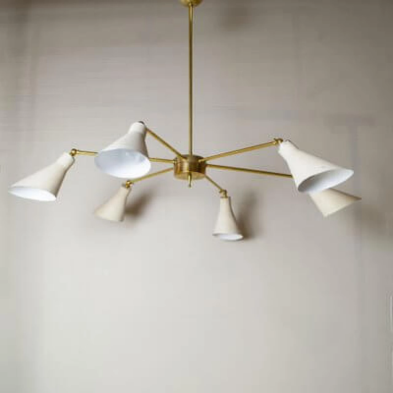 Light chandelier with aluminium shades and brass frame in the style of Stilnovo Models, 1950s 8