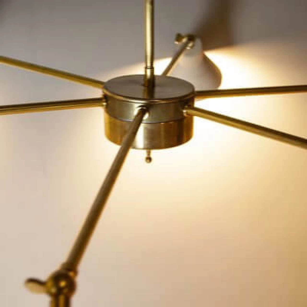 Light chandelier with aluminium shades and brass frame in the style of Stilnovo Models, 1950s 9