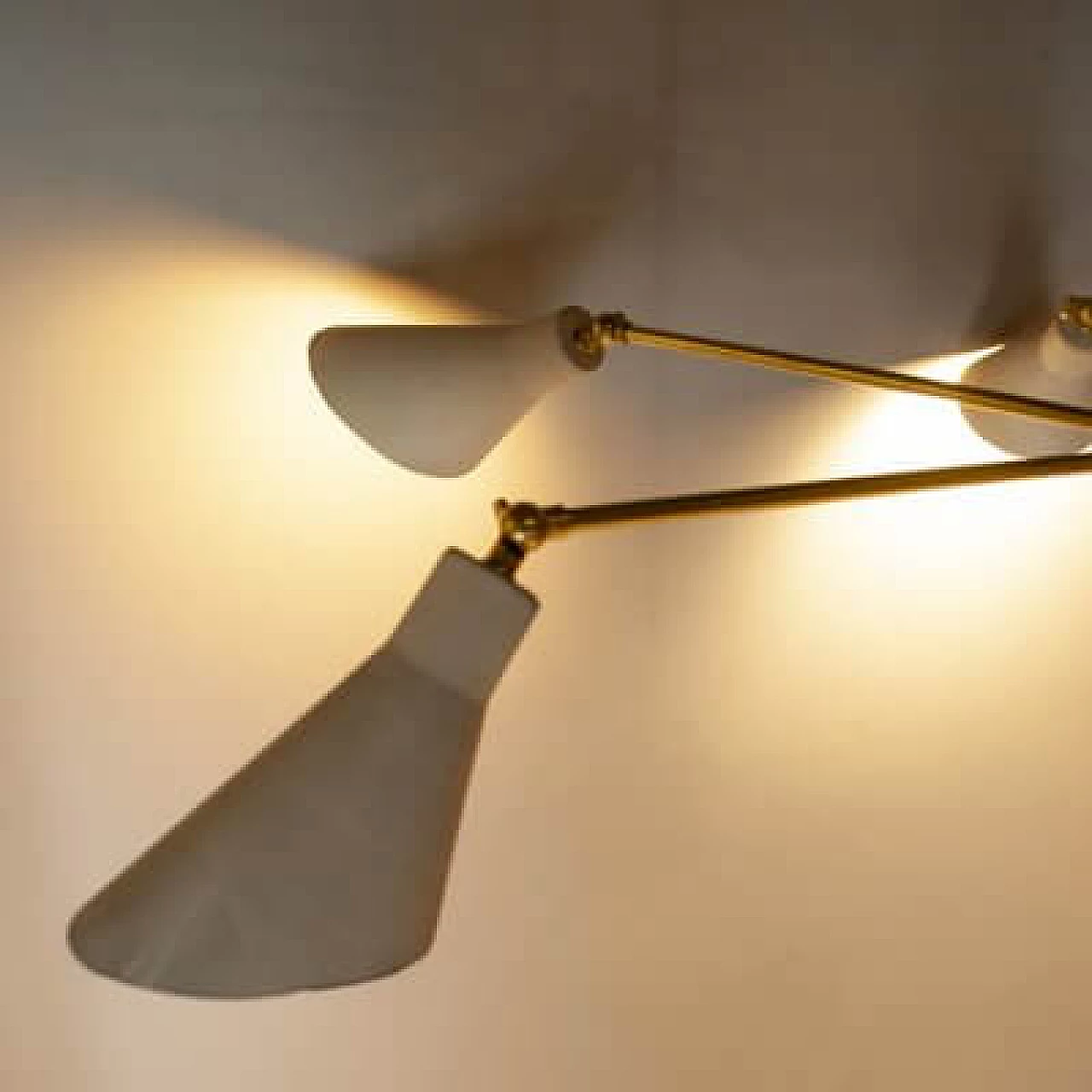 Light chandelier with aluminium shades and brass frame in the style of Stilnovo Models, 1950s 10