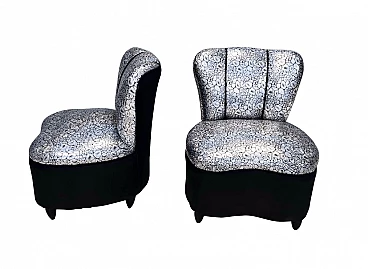 Pair of lounge armchairs with holographic fabric upholstery, 1950s