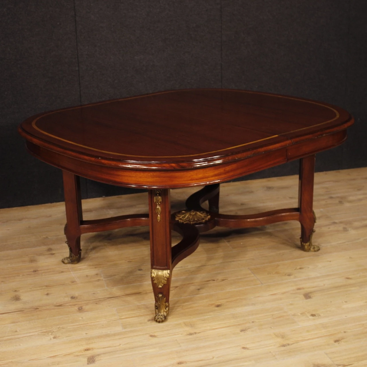 Mahogany extendable table with inlay and bronze details, 1930s 1