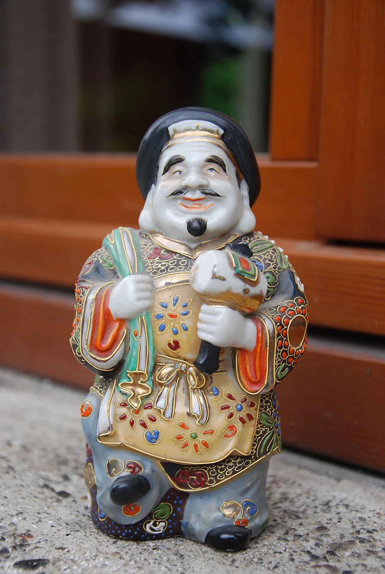 Japanese glazed porcelain Daikoku statuette, 1930s 1