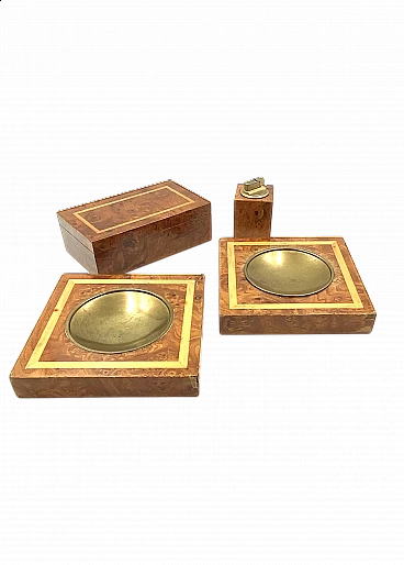 Pair of ashtrays, lighter and cigar holder in brass and wood, 1970s