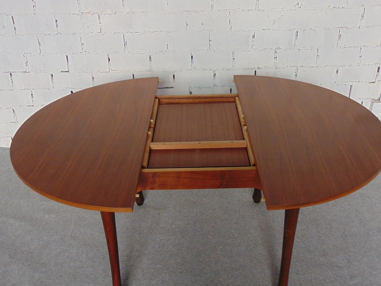 Round extendable wood table with teak laminate top, 1960s 7