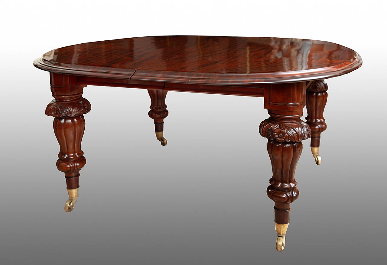 Victorian extendable solid mahogany table with casters, mid-19th century 1