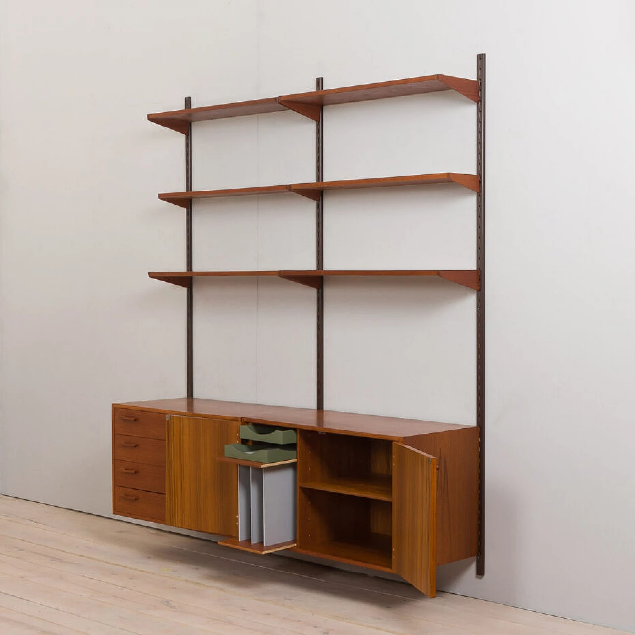 Danish modular wall-mounted teak bookcase with cupboard and drawers by K. Kristiansen, 1960s 7