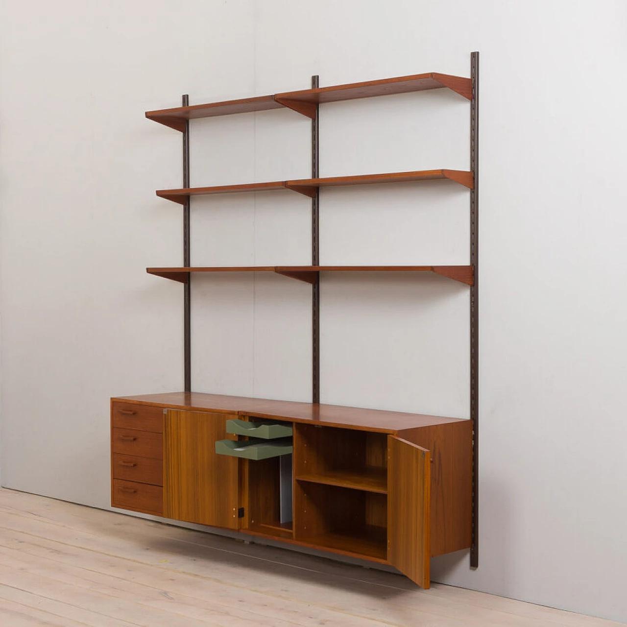 Danish modular wall-mounted teak bookcase with cupboard and drawers by K. Kristiansen, 1960s 8