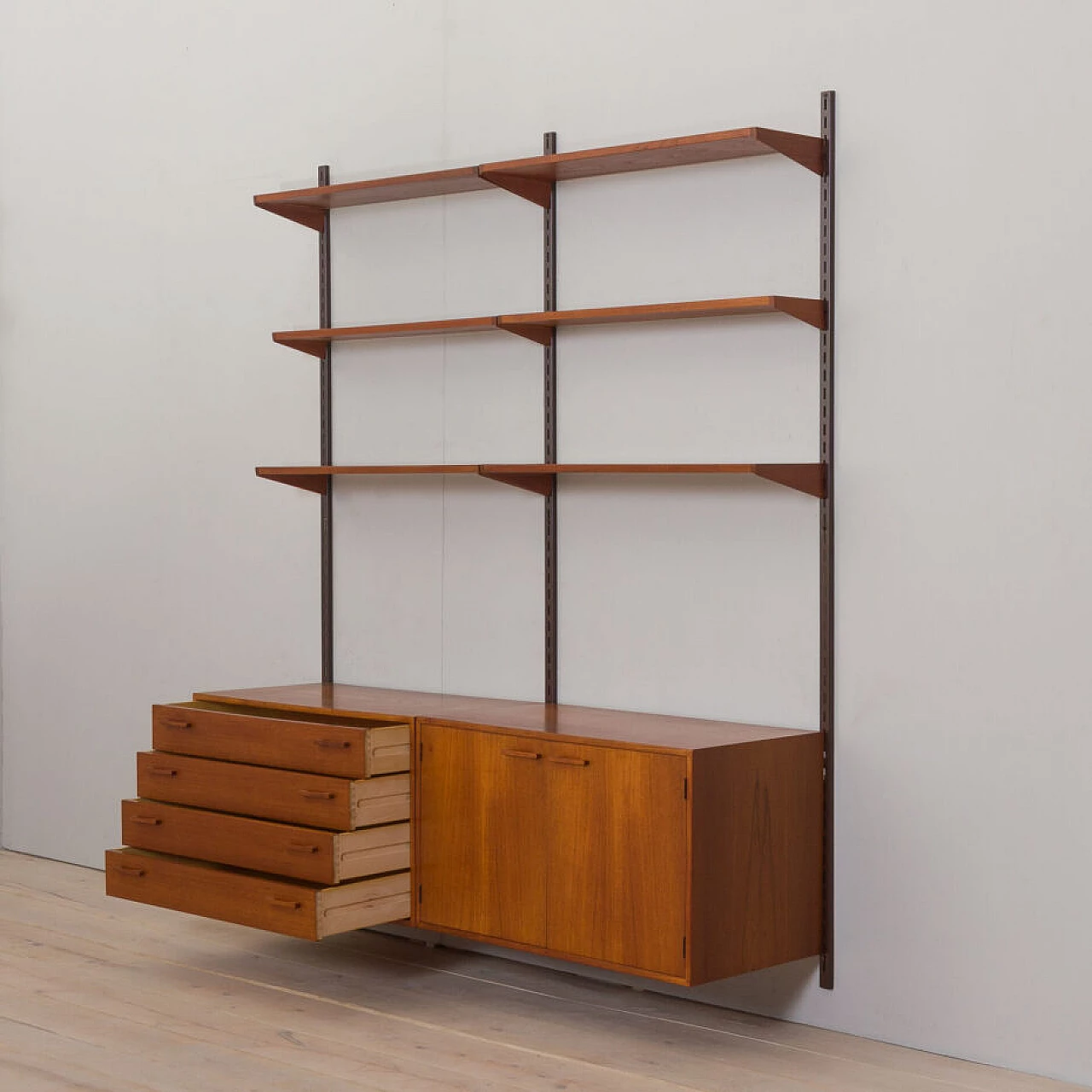 Danish modular wall-mounted teak bookcase with cupboard and drawers by K. Kristiansen, 1960s 9