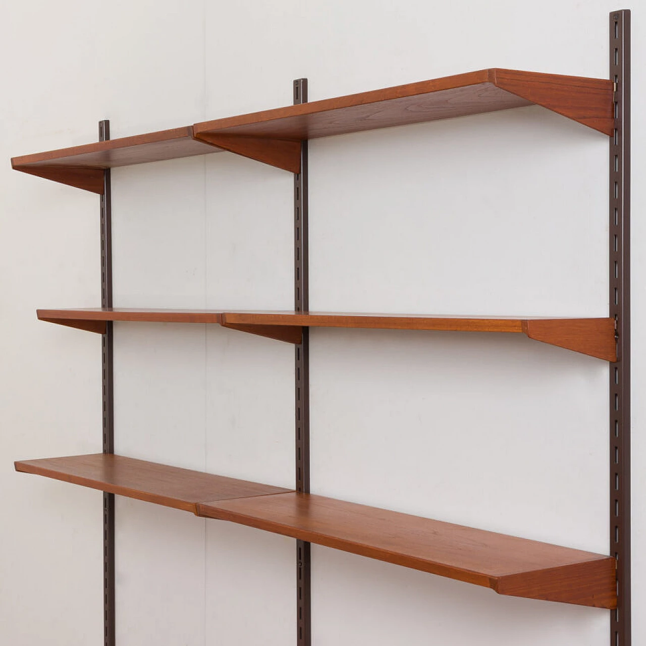 Danish modular wall-mounted teak bookcase with cupboard and drawers by K. Kristiansen, 1960s 12