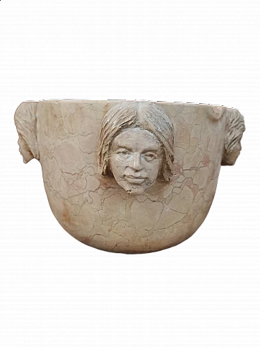 Pink Nembro marble mortar with carved heads, late 19th century