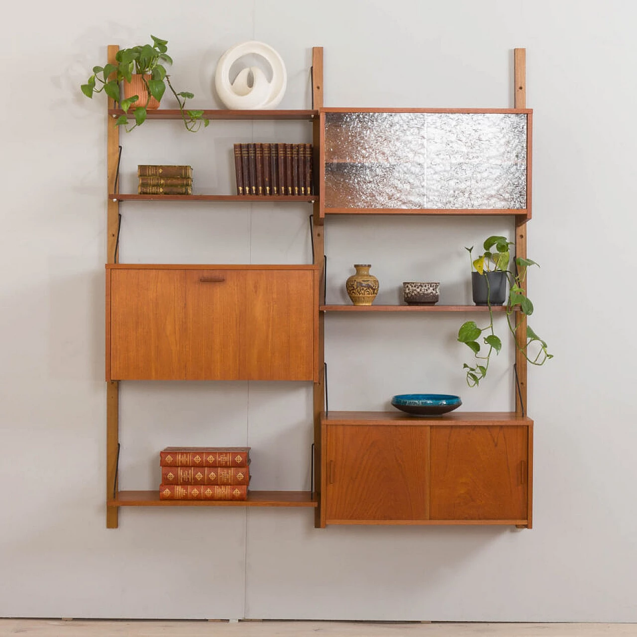 Danish modular teak bookcase with four wall shelves and three cabinets, 1960s 2
