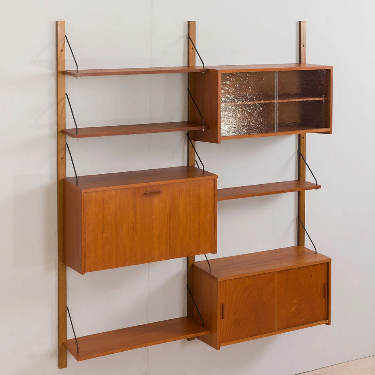 Danish modular teak bookcase with four wall shelves and three cabinets, 1960s 19