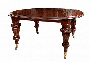 Victorian extendable solid mahogany table with casters, mid-19th century