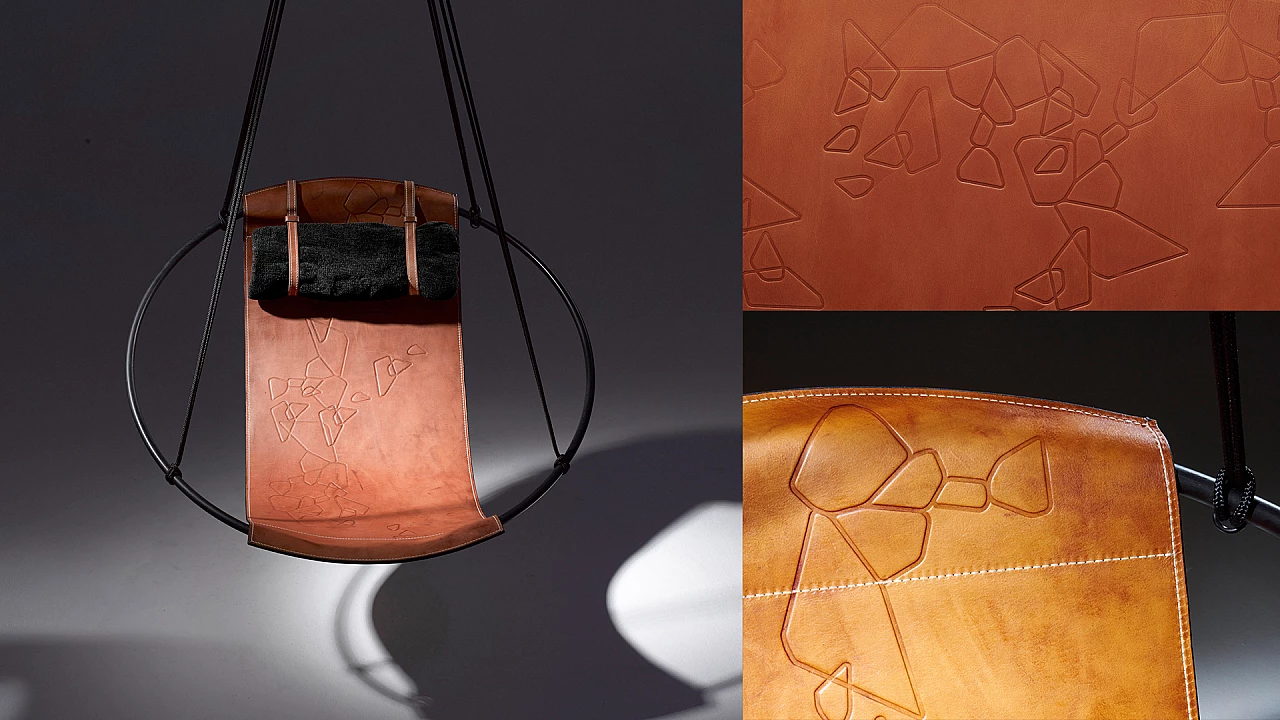 Poltrona sospesa in metallo e pelle marrone con motivo geometrico 1