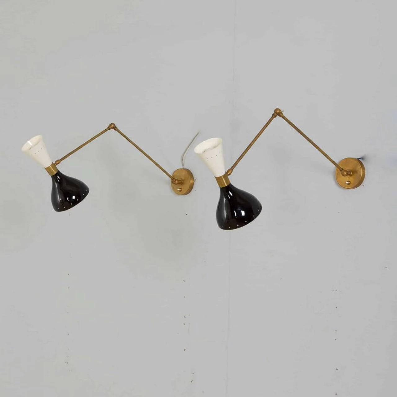 Pair of adjustable brass wall sconces with black and white lacquered lampshades, 1970s 1