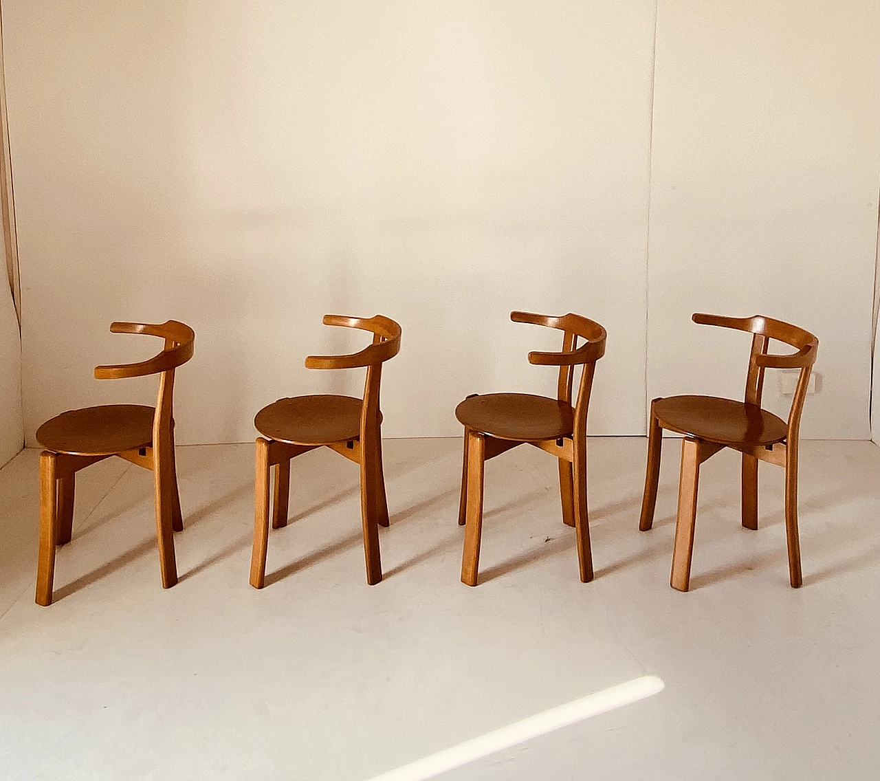 4 Chairs in curved solid beech, 1970s 5