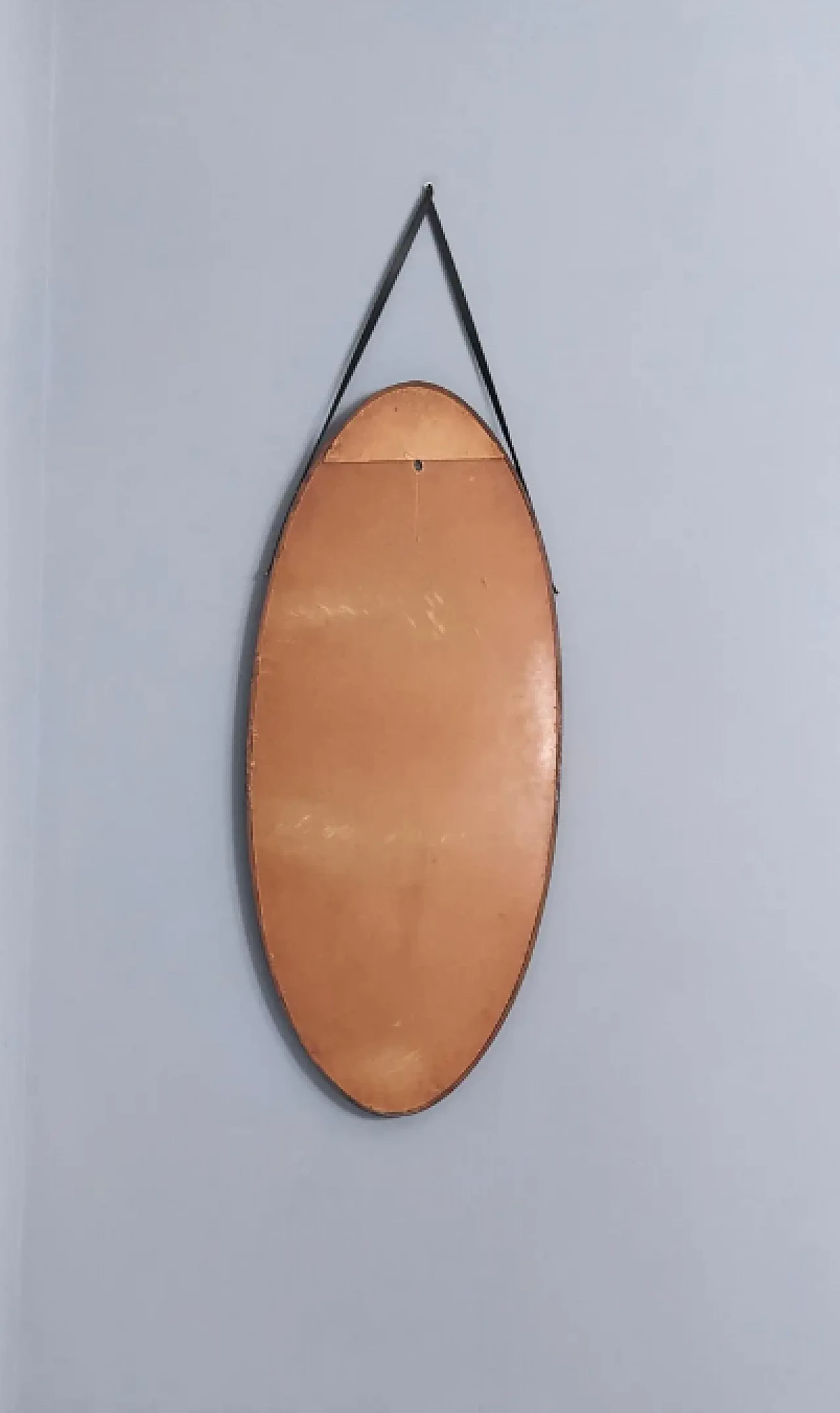 Oval wall mirror with ebonised wood frame and leather hook, 1960s 5