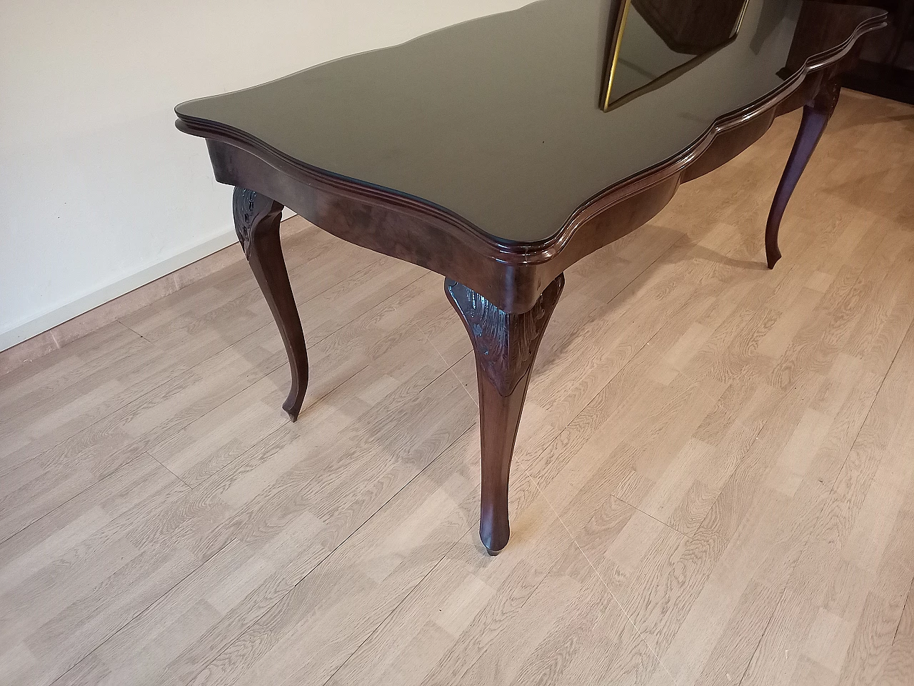 Chippendale style walnut, mahogany and smoked glass table, 1920s 23