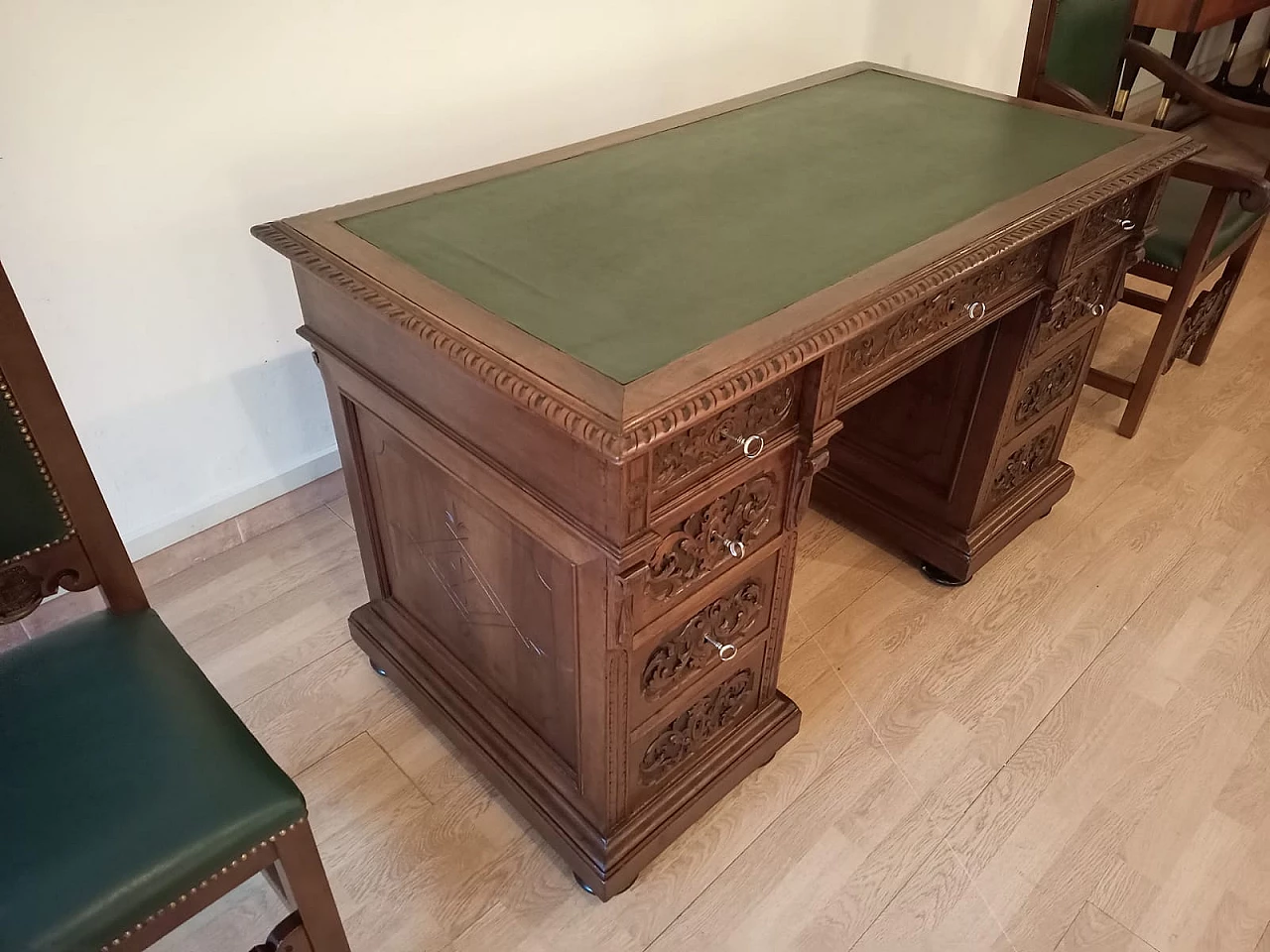 Walnut and green leather desk, armchair and chair, 19th century 17