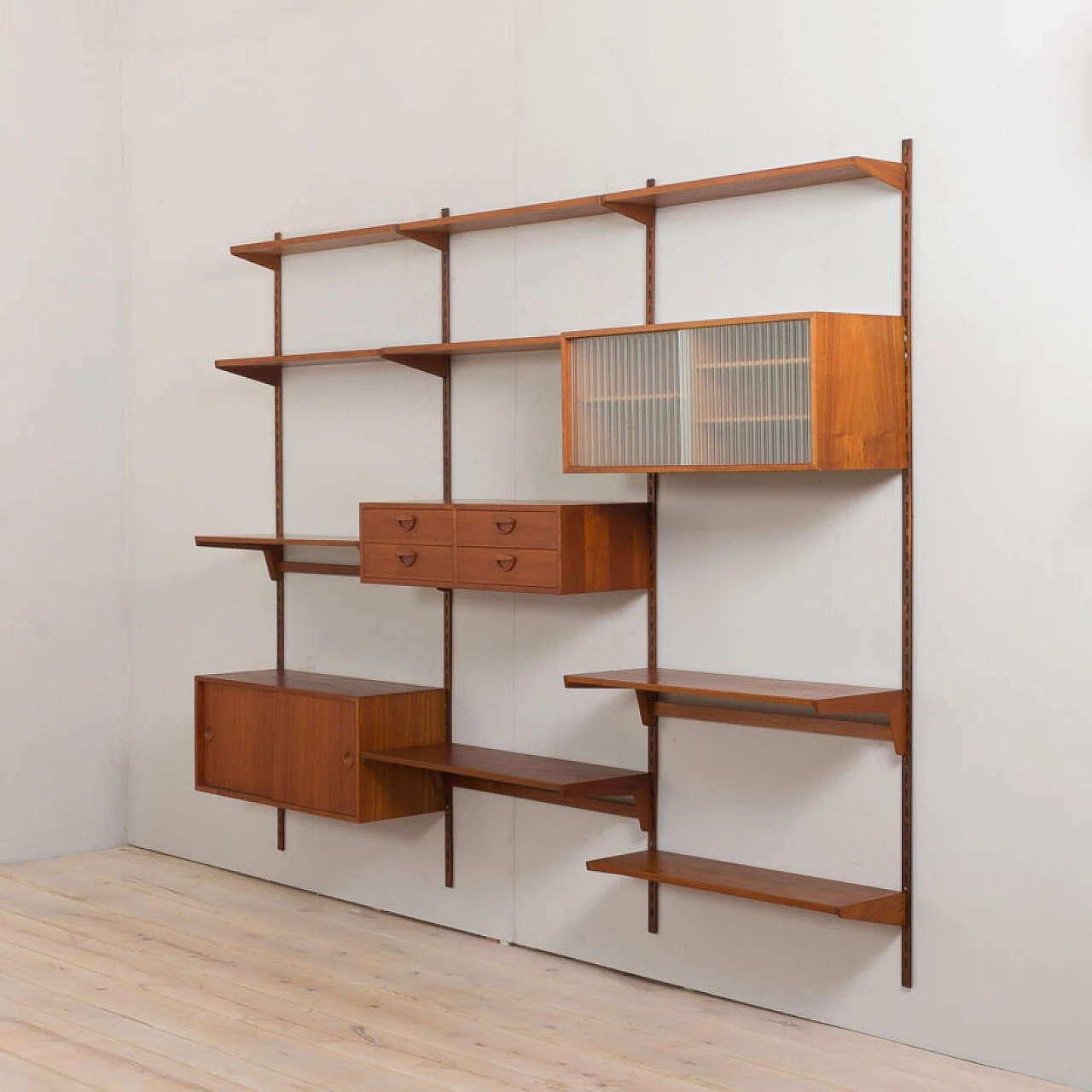 Modular teak bookcase with nine wall shelves and three cabinets by K. Kristiansen for FM Mobler, 1960s 6