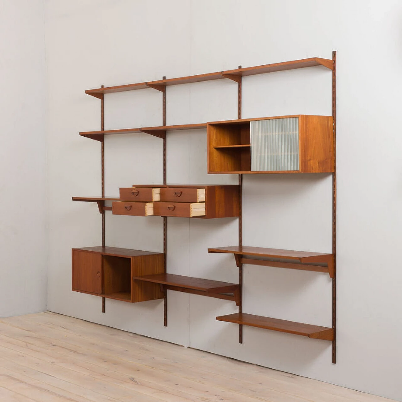 Modular teak bookcase with nine wall shelves and three cabinets by K. Kristiansen for FM Mobler, 1960s 7