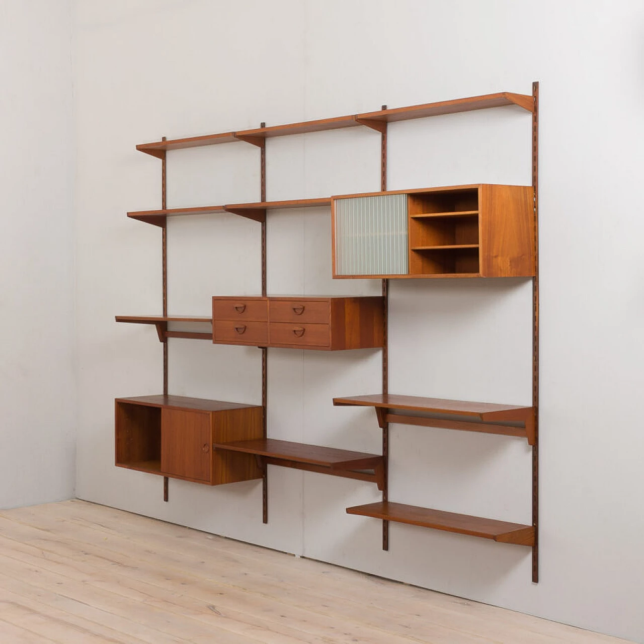 Modular teak bookcase with nine wall shelves and three cabinets by K. Kristiansen for FM Mobler, 1960s 8